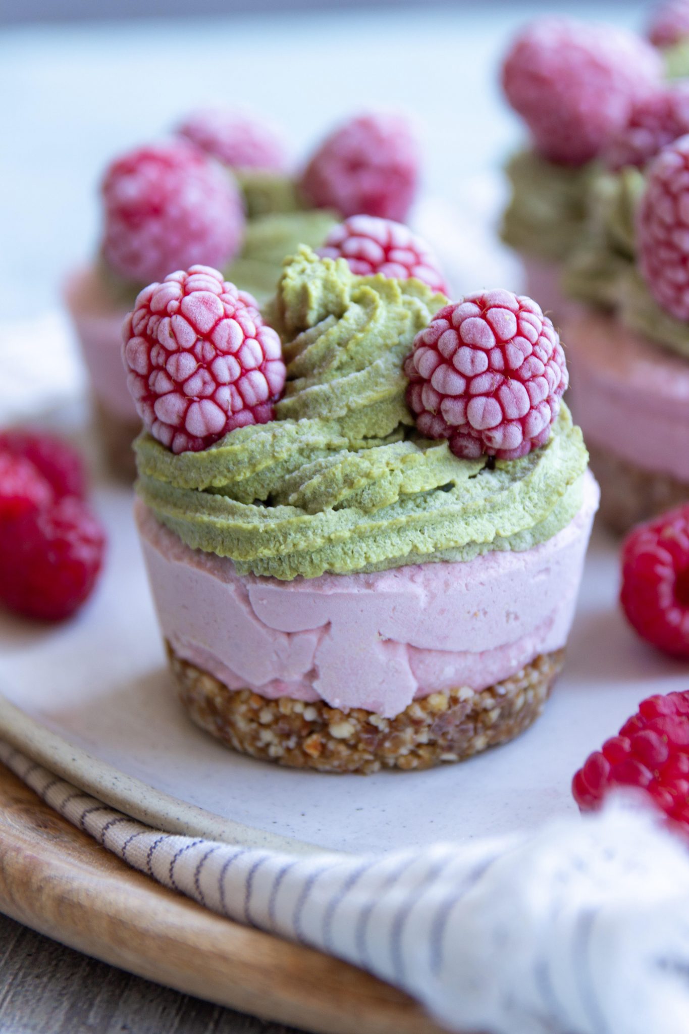 vegan matcha raspberry cheesecakes