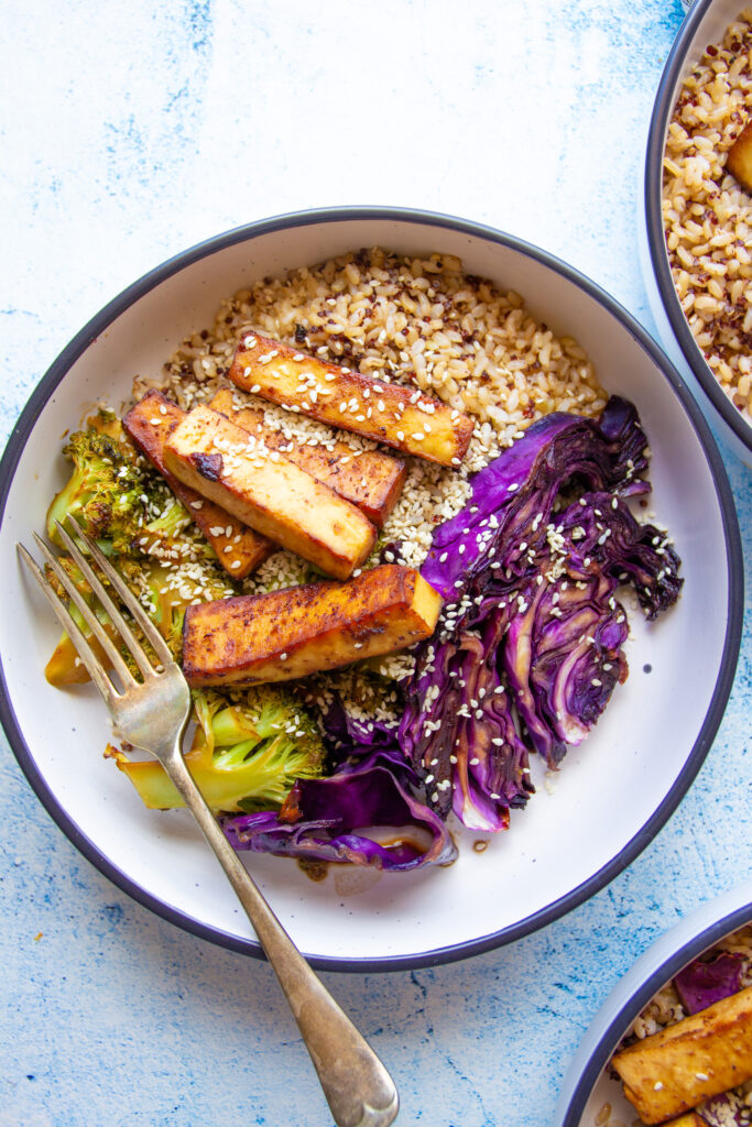 vegan baked miso tofu bowl with broccoli red cabbage