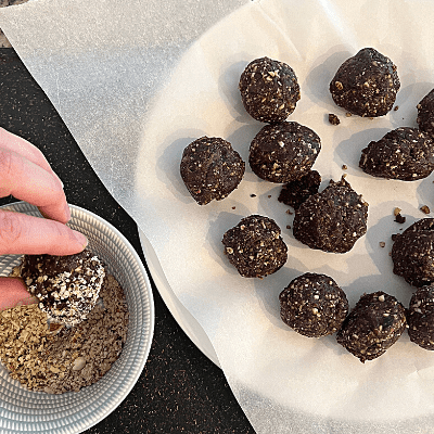 Vegan Chocolate Hemp Energy Bites Recipe roll the balls in the topping